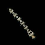 Regal Emerald & Kundan Chandbali Hair Choti with Jhumka Accent